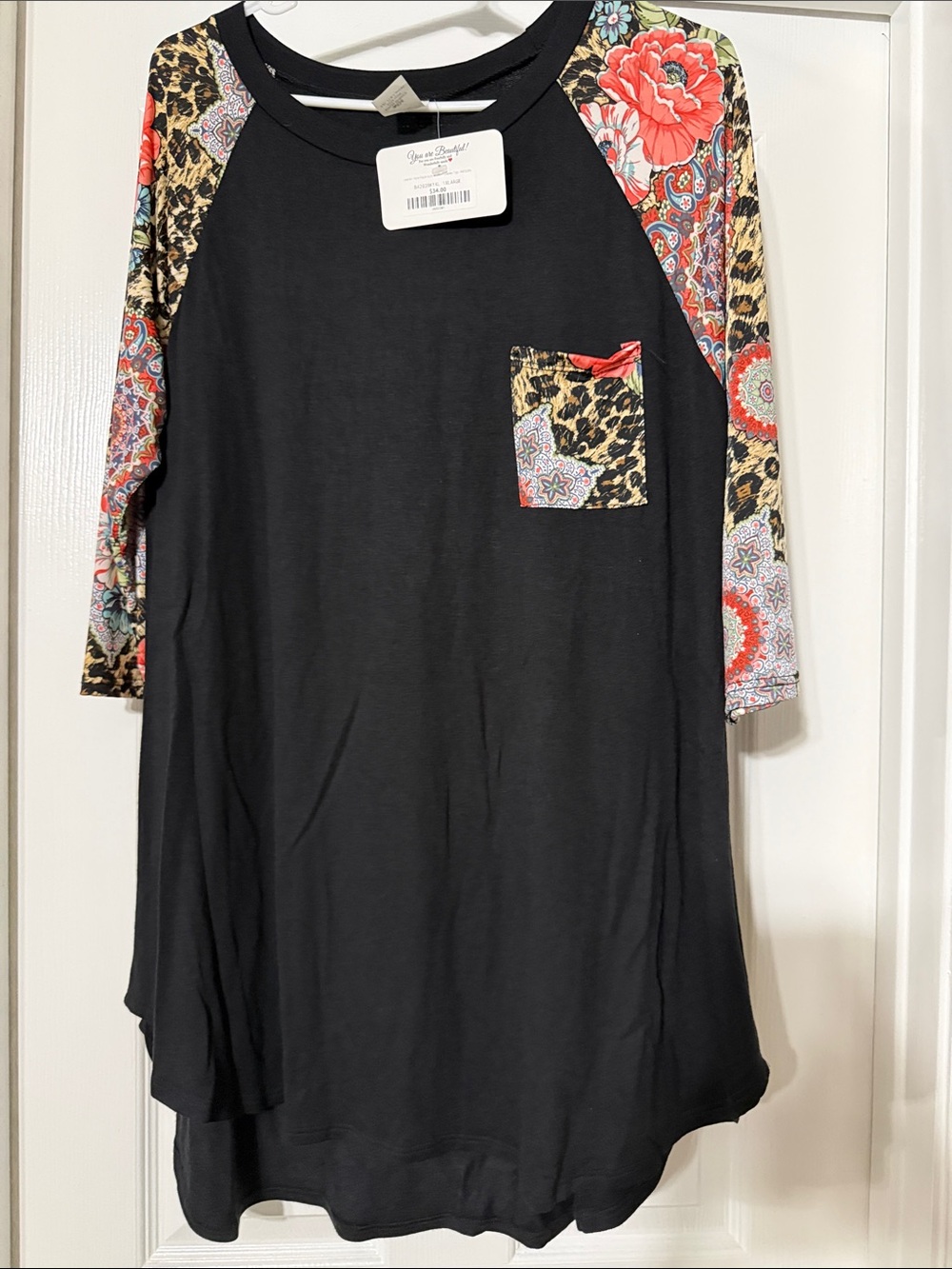 Black Tunic with Floral & Leopard Print Sleeves and Pocket. 3/4 sleeves